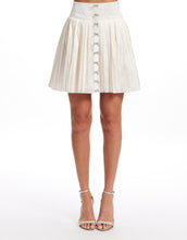 Load image into Gallery viewer, PLEATED MINI SKIRT WITH CRYSTAL BOWS
