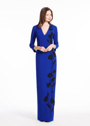 STRETCH CREPE VNECK GOWN WITH APPLIQUE FLOWERS ROYAL