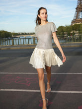 Load image into Gallery viewer, PLEATED MINI SKIRT WITH CRYSTAL BOWS
