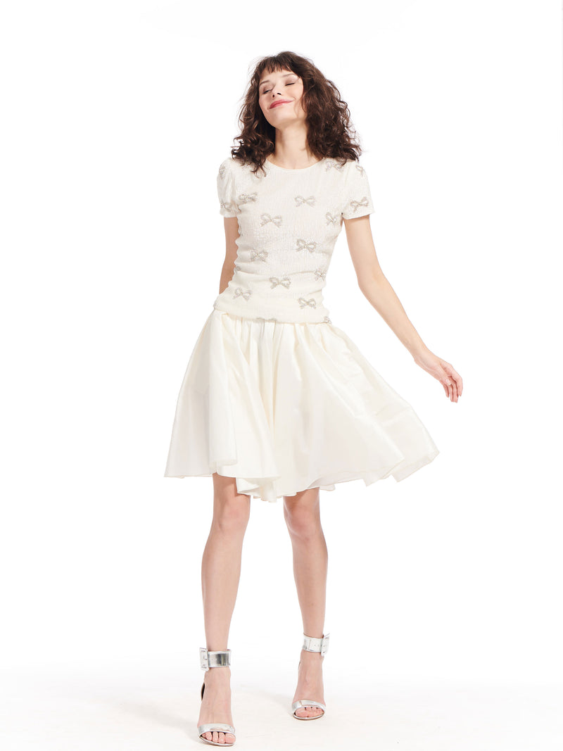 IVORY SHORT SLEEVE SEQUIN TOP WITH CRYSTAL BOWS